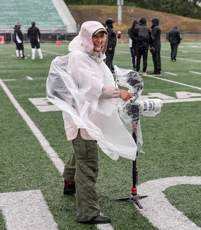 Nicole filming on the field